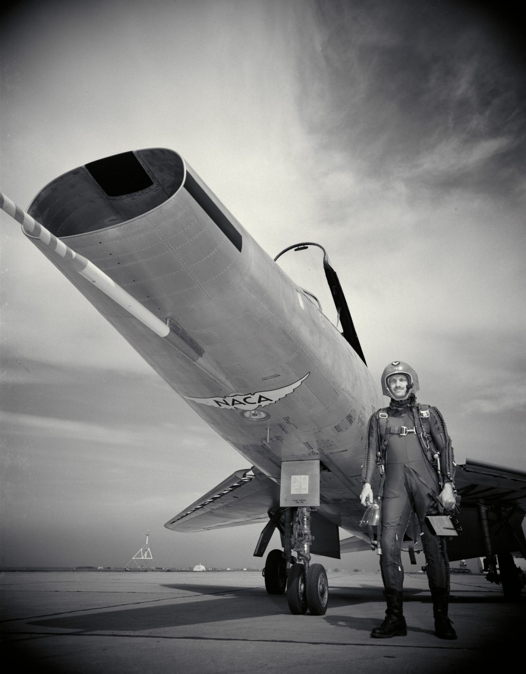 NACA Test Pilot Poses with Plane